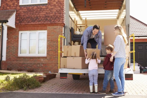 A professional packing team preparing items for storage in Roehampton
